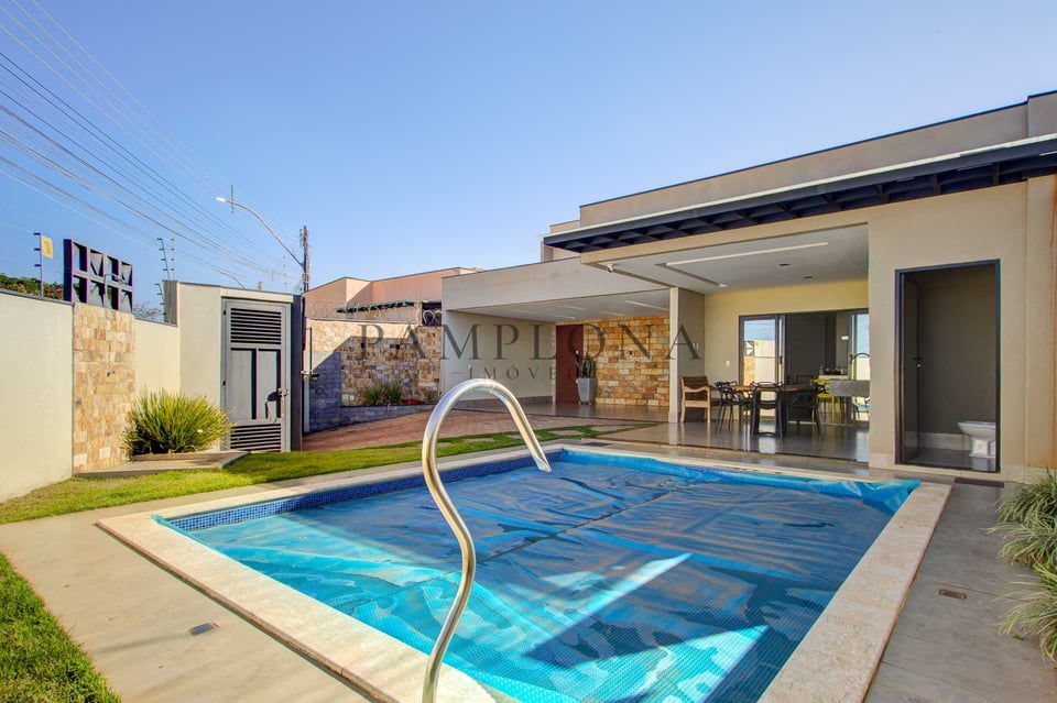 Casa 4 suítes com lazer completo — Arniqueira